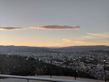 High angle view of buildings against sky during sunset