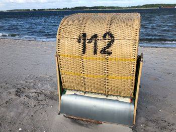 Text written on sand at beach