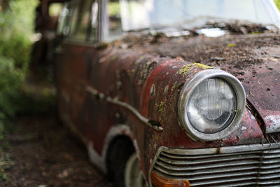 Close-up of abandoned car