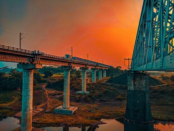 Bridge against sky during sunset