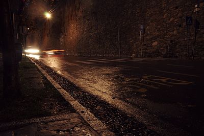Cars on street at night