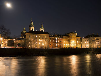 Illuminated buildings at night