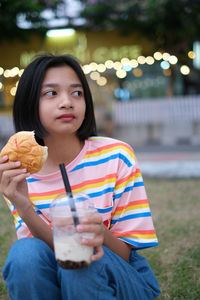 Young woman eating food