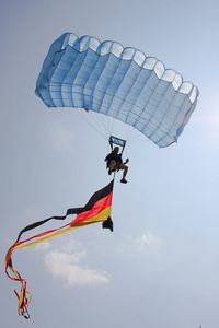 Low angle view of kite flying against clear sky