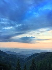 Scenic view of landscape against sky during sunset