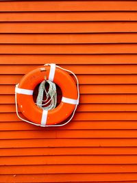 Life belt handing on wall