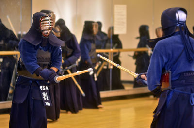 People practicing martial arts