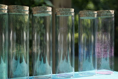 Close-up of empty bottles on table