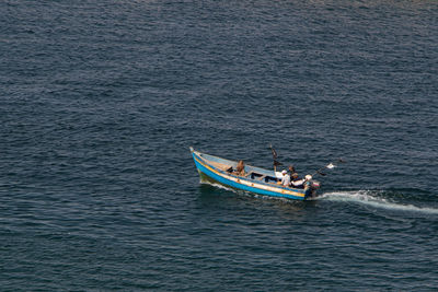 High angle view of sailboat sailing on sea