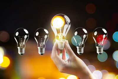 Close-up of illuminated light bulb