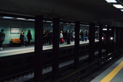 People waiting at railroad station