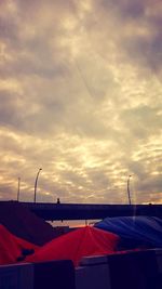 Tent on roof against sky