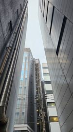 Low angle view of modern buildings in city