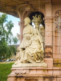 Low angle view of statue against sky