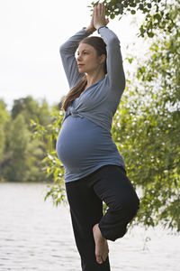 Pregnant woman practicing yoga