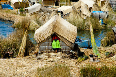 Panoramic view of beach hut on field