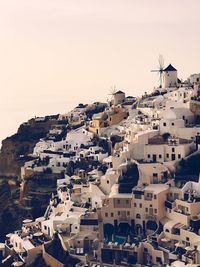 High angle view of santorini townscape against sky