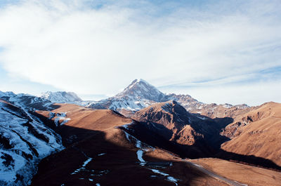 Scenic view of snowcapped mountains against sky on 35mm ekrar 