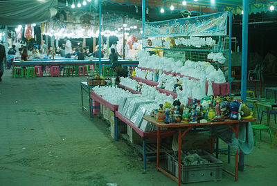 People at market stall