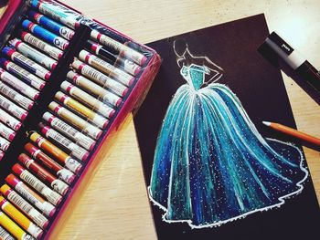 High angle view of multi colored pencils on table