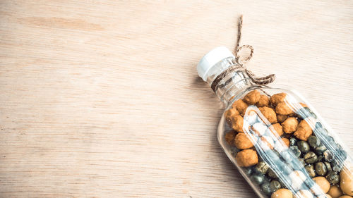 Food in bottle on table