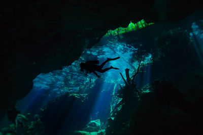 People swimming in sea