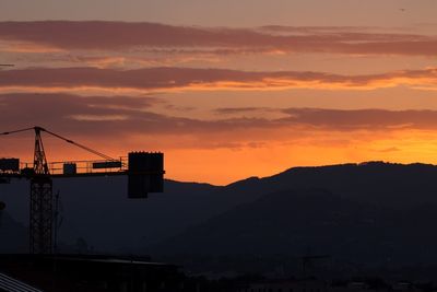 Scenic view of mountains at sunset