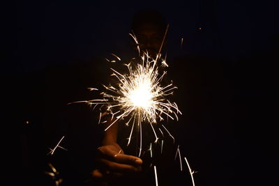 Firework display at night