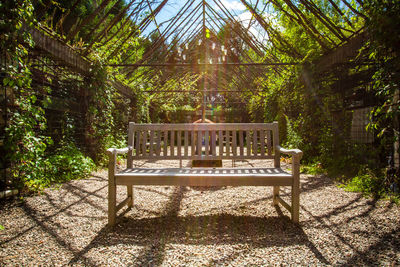 Empty bench in park