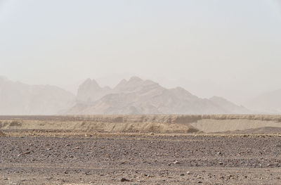 Scenic view of desert against sky