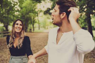 Couple standing at park