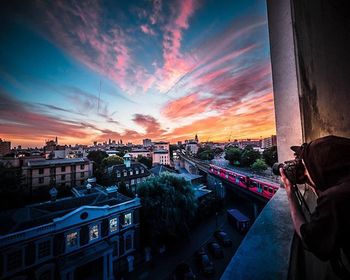 Cityscape against sky during sunset