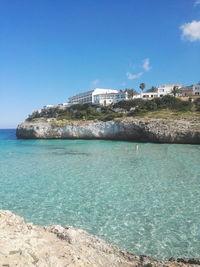 View of buildings against blue sky
