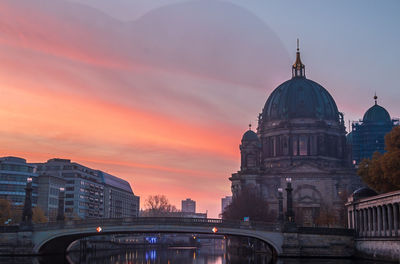View of historic building against sky during sunset