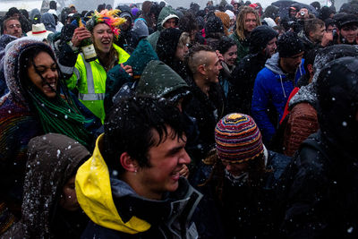 Group of people at market during winter