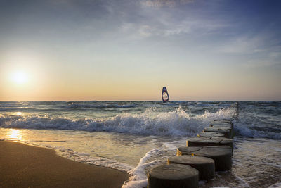 Scenic view of sea against sky during sunset