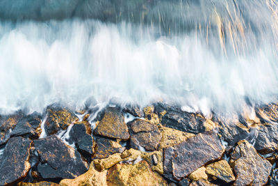 Panoramic shot of rocks and waves