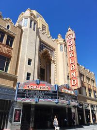 Facade of historic fox theater against sky