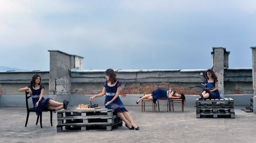 Young couple sitting on chair