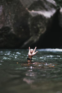 Woman swimming in lake