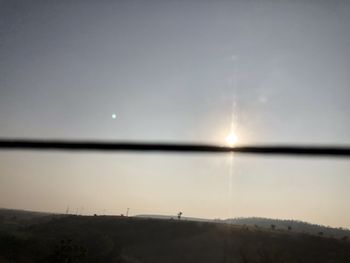 Scenic view of landscape against sky during sunset