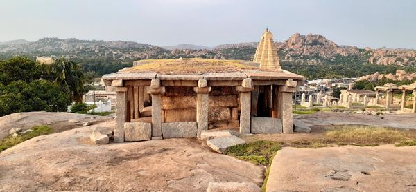 View of temple against building