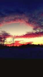 Scenic view of dramatic sky during sunset