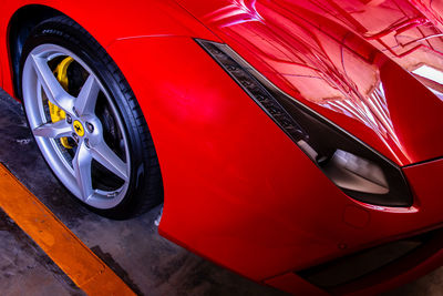 High angle view of red car wheel