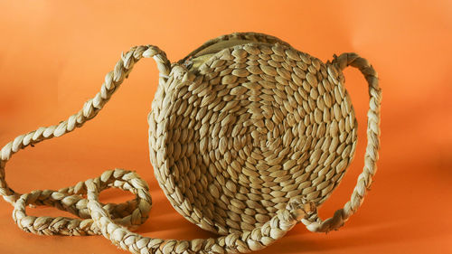 Close-up of wicker basket on table