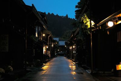 Illuminated street at night