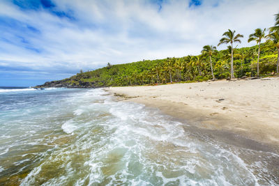 Scenic view of beach against sky