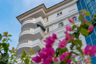 Modern ventilated facade with balconies. 