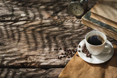 High angle view of coffee cup on table