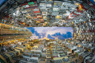 High angle view of buildings in city against sky